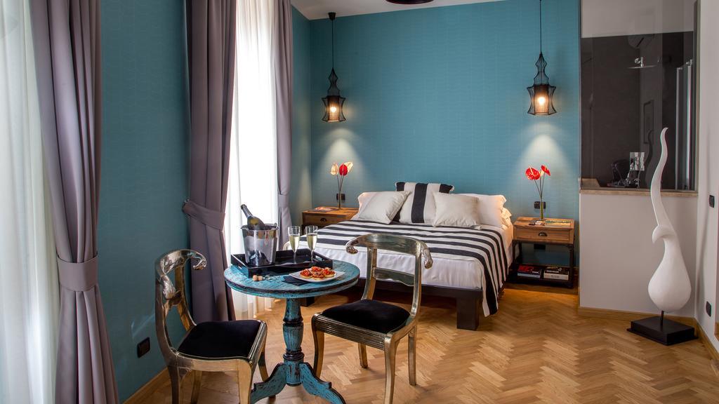 Qt Suites Roma Zimmer foto